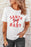 White SANTA BABY Gift Bow Graphic Tee