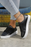 Black Lace Up Laser Cut PU Leather Sneakers